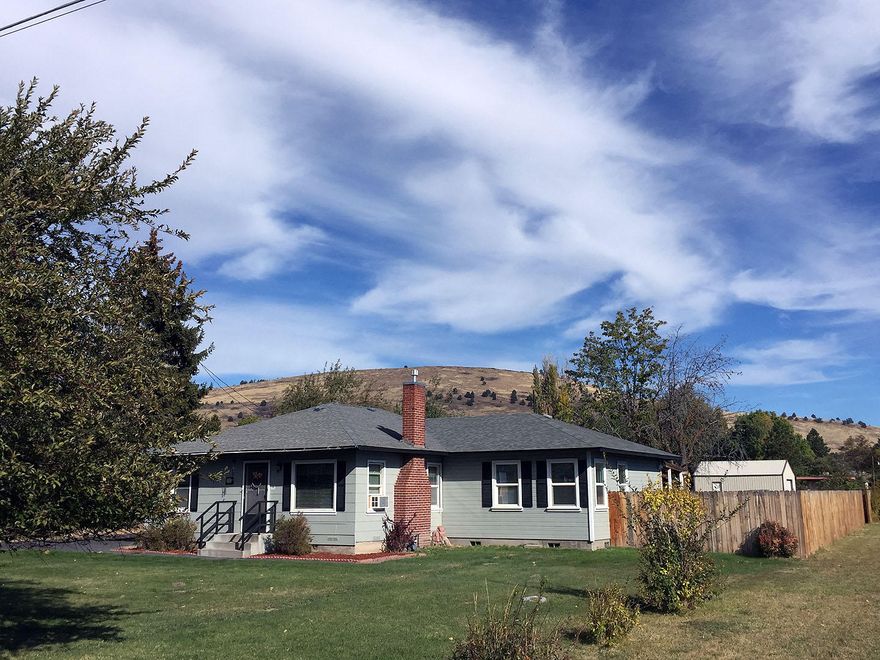 Approximately one acre with private home located at the end of Nile Street on irrigated land. Single level split floor plan with newer large suite. Home was updated with a large bedroom and  bath en suite. The large bedroom has access to the covered porch that looks out to the private back yard with mountain views. Paved driveway leads to a detached single garage that is currently used as a single car garage with additional work space. The large shop on the back of the property has a new concrete floor. This home is your special place to live; reasonable taxes, irrigated land and plenty of privacy. Property has plenty of space to park your RV and extra parking for whatever you own. The rear entry porch leads directly into your laundry/mud room area. Nile Street is tucked away yet close to major shopping like Home Depot, Albertson's Market, Taco Bell, Burger King and many more. Klamath Falls is a great place to live, providing a small town casual atmosphere.