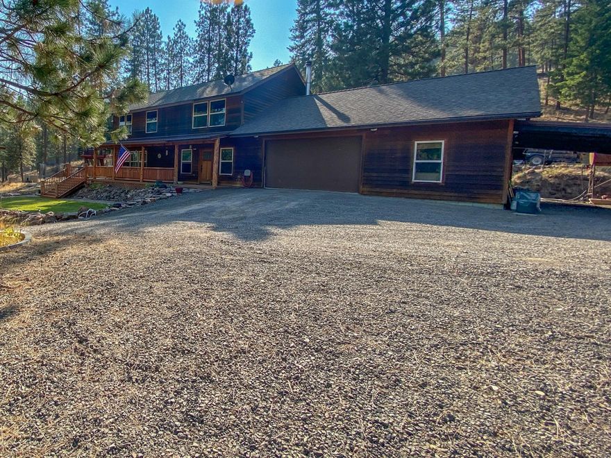 Beautiful craftsmanship throughout this home! Home was taken down to the studs & completely remodeled in 2010 w/ concrete & granite counters, beautiful wood accents,
central vac. State of the art solar system w/ back up 15 KW generators, 24 solar panels, new wood/oil burning forced air furnace, 1000 gallon diesel tank & 1000 gallon
propane tank. Two car garage has an additional shop area and loft. Incredible private setting with a seasonal creek and pond, garden area, chicken coop & tree house and fire pit. Gas range and gas dryer are both propane. New 20 year batteries just installed.