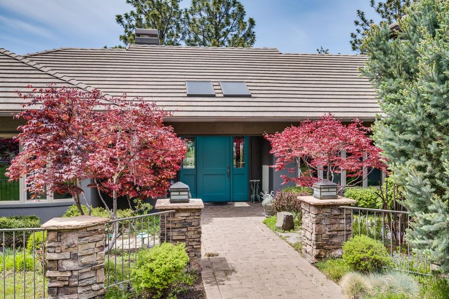 Million Dollar Views! This never before listed home is extra special because it is a true SINGLE level, with spectacular western mountain views on a premier lot on Awbrey Butte.  Red vine maples, a bubbling water feature and lots of color in the courtyard greets you at the door inviting you into a large foyer presenting you with ponderosa and mountain views. You will find more of the same as you glide from room to room. This home was supremely well-designed with a comfortable floor plan. Tons of amenities including cherry wood built-ins, radiant floor heat throughout, 2 fireplaces, 9 ft ceilings, central vac, hot tub, lots of windows, paver driveway, gorgeous landscaping, a spacious paver deck & much more. An RV garage is in addition to the beautiful 3 car garage . Surrounded by nature, wildlife & ever-changing colorful views of the sky and mtns equals a retreat you will never want to leave!  Only 10 min from downtown Bend and 5 minutes from Awbrey Glen golf this home is a must-buy!