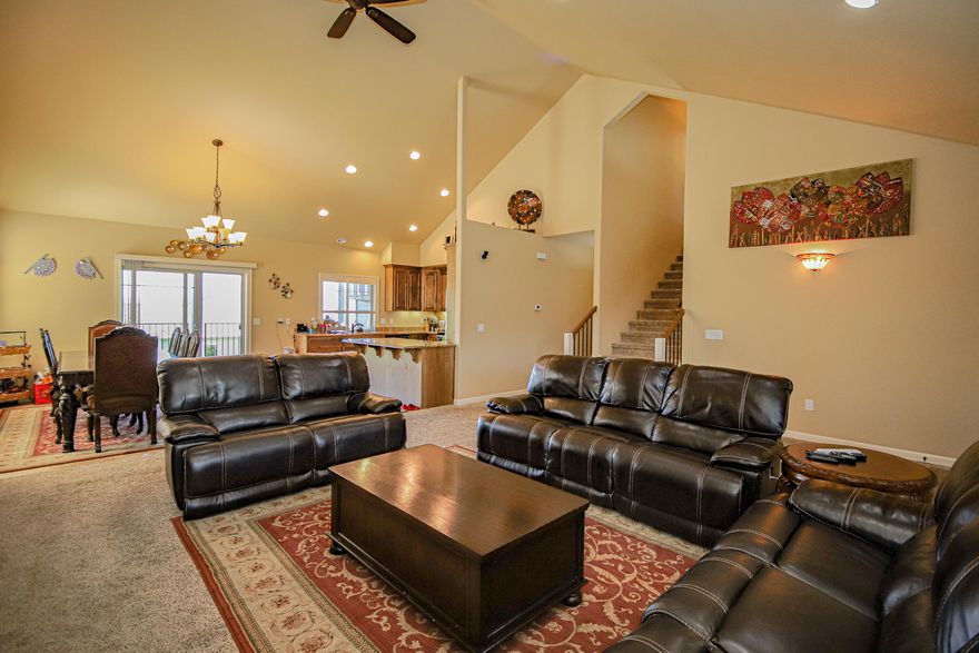 Up at the top of the East McAndrews hill, you'll find this beautiful home in the lovely Vista Pointe neighborhood - where your family will enjoy valley vineyard views, walking trails, sports court, splash park, picnic areas and playground! This large, well-appointed Craftsman-style home built in 2013 is sure to impress! Huge great room with two-story ceilings opens up to dining and kitchen. Main home has 4 beds, 2.5 baths plus a loft! Just outside the back patio stairs, is a private entrance to a suite with a bedroom, full bath, closets and living area! Perfect for mother-in-law, guests, teenager get-away, apartment, media room!