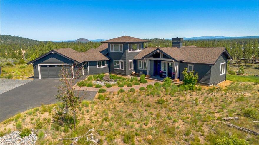 Rare chance to live in Bend's exclusive Tree Farm neighborhood! Bordered by Shevlin Park and US Forest Service land, you're at the doorstep of Mother Nature's playground. This incredible custom home sits on 2 acres and backs to open space for optimal privacy and panoramic views. The newly updated kitchen features quartz countertops, a walk in pantry & hickory cabinetry. There are beautiful oak hardwood floors throughout the main level. The primary suite is complete w/ a walk in shower and a soaking tub that has views over the tree tops. Upstairs you'll find the Eagles Nest bonus area that could be used as an office or 4th bdrm. This Earth Advantage home features double wall construction, energy recovery ventilation, ductless heating/cooling, tankless water heater and owned solar panels. The detached, fully insulated 1184 sq ft RV garage & shop w/ 240v power, running water, plus an RV dump is a hobbyist's dream!