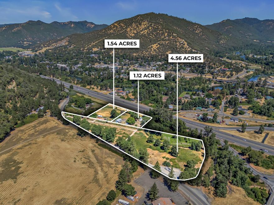 Rare development opportunity in Gold Hill, Oregon—this 7.21-acre, 3-lot package offers an approved 40- space RV park site plus existing rental income and infrastructure. The primary parcel at 9816 Old Stage Rd (4.57 acres) comes with Limited Use approval already secured, along with completed surveying, engineering, and planning. The approval is valid for another 3 years w/1-yr. extension available. A well producing approximately 10 GPM is already in place. The two additional lots, 9902 and 9904 Old Stage Rd (1.52 and 1.12 acres), are zoned RR2.5 and generate rental income. Both have power, one has septic, and they share a well. GHID irrigation rights. With significant work already completed and owner-carry terms available, this is a compelling opportunity to step into a prime RV park project
