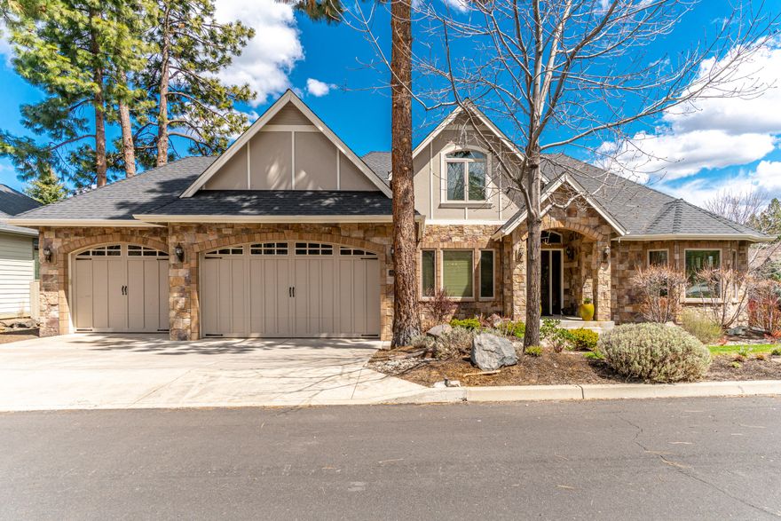 Amazing home in River Rim, located close to trails to the Deschutes River, parks and open space. Large corner lot over a ¼ acre. Northwest style construction with great room, vaulted with clear story ceiling. Living area with stone fireplace, built ins, hardwood and rough-hewn tile floors. Gourmet kitchen features granite counters and Jenn-Aire stainless-steel appliances, with separate ice maker, raised counter seating for six and large pantry. A formal dining room with 2 sets of French doors. Large master bedroom on the main floor with room for reading area and 2 closets. Elegant master bath, granite counters, dual sinks, walk in shower and soaking tub. Second on suite bedroom on first floor, great for guest room or office, with full bath, tiled shower and tub. Two bedrooms upstairs with Bonus room Upstairs bath is large enough for tiled walk-in shower.  Back yard is fenced and landscaped, raised beds for garden all covered with timed sprinklers, paver patio.