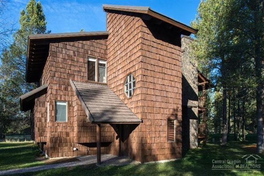 Three-level lodge style condo w/two stone fireplaces, located on the Meadows Golf Course. Entrance on the ground level has a storage area. The 2nd level includes two bedrooms & two bathrooms. Master updates include dual custom vessel sinks. Upper level includes the great room, dining, kitchen & deck overlooking beautiful trees, local wildlife & the golf course. Don't forget the roof top deck. Located next to the Village, SHARC & a short distance to the Resort. Family-owned for past 31 yrs. Never been rented