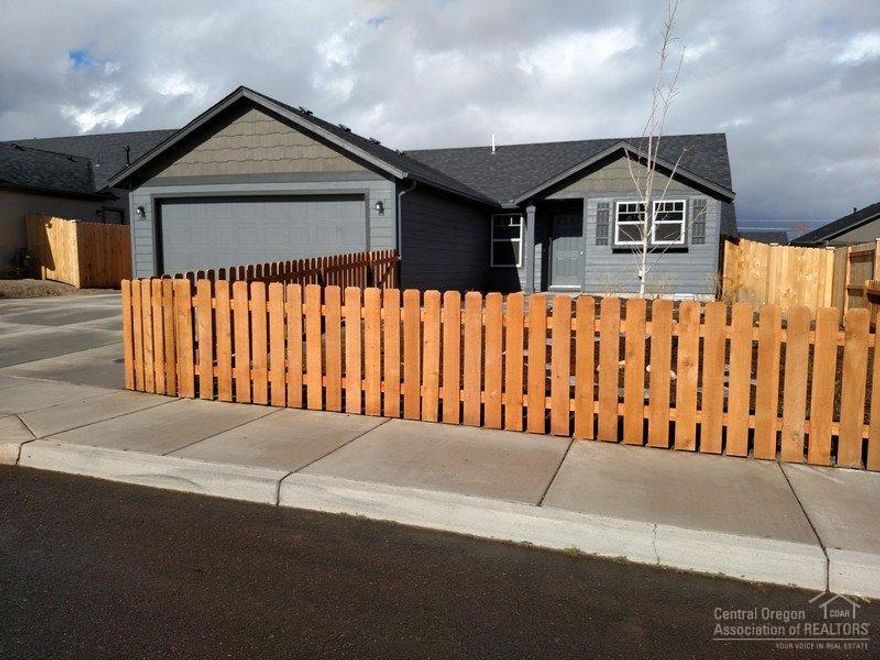 Light and bright home in Redmond Village Pointe's quiet convenient neighborhood. Only 6 months young! Lovely Hayden Home Clearwater resale with $15,000 in upgrades including gas fireplace, Bourbon laminate flooring, upgraded carpet in bedrooms, raised vanities and a 12x20 RV pad. Garage has the 4 foot extension and a garage door opener. Fully fenced and ready for creative landscaping! Welcome Home!