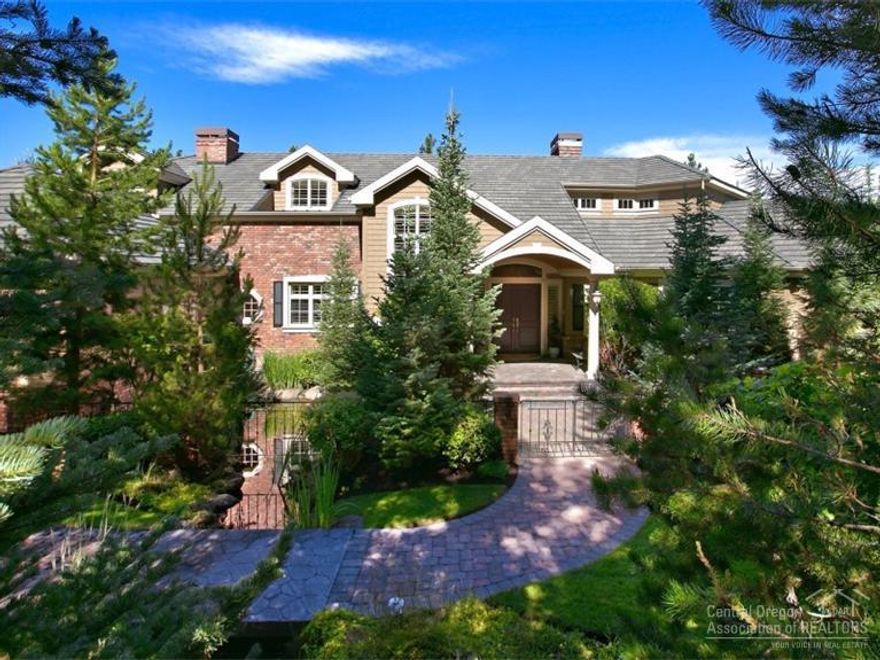 Stunning home w/the most spectacular Cascade Mtn views on over an acre! Custom built home by Scott Wilcox w/the finest of finishes. Kitchen boasts solid slab granite countertops & island w/gas cook top, cherry wood cabinets, cherry hardwood floors, box beam ceilings, gas FP & breakfast nook. Vaulted LR, wood beam ceilings, wood burning FP & wet bar. Spacious master with gas FP, coffered ceiling & luxurious bath. Lush, mature landscaping both front & back w/lrg paver patio. 13X13 green house. One of a kind!