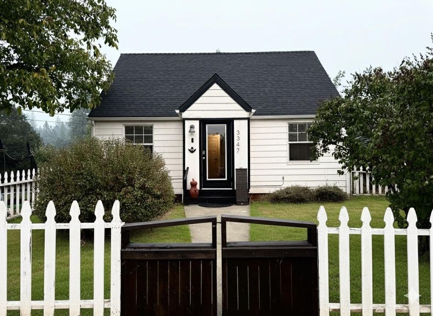 Welcome to 3347 Cloverlawn Dr. a charming two-story cottage nestled on a spacious 0.7-Acre lot. Enjoy peaceful country living just minutes from downtown Grants Pass. Inside you'll find a welcoming layout featuring laminate flooring throughout the mail level and a beautifully updated kitchen with granite countertops, subway tile backsplash, open wood shelving, and a deep stainless-steel sink. The cozy dining area showcases light barn-wood accents that give the space a warm country feel. The main bedroom is conveniently located on the first floor, with two additional bedrooms upstairs perfect for family, guests or a home office. Enjoy the versatility of an oversized one-car garage/shop, with attached carport, and a fully enclosed breezeway that provides extra comfort and functionality year-round! Seller is an Oregon licensed realtor.