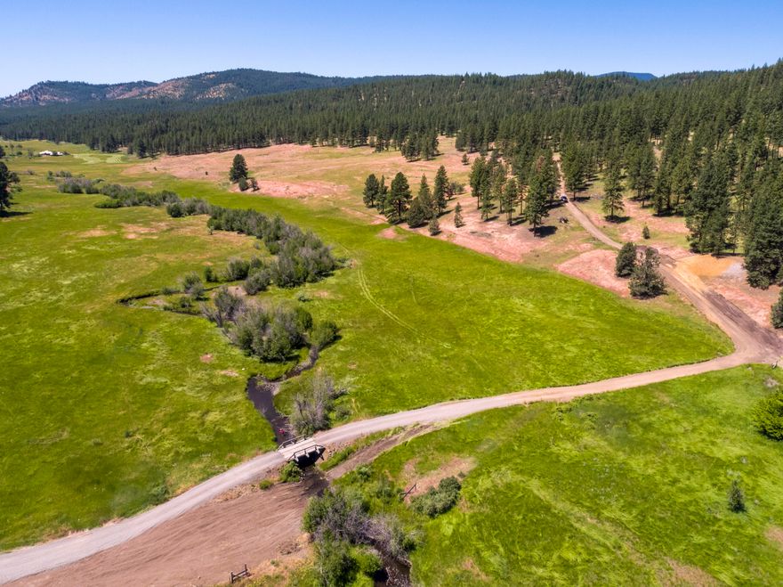 Ochoco Creek runs through buildable 640 acres bordering the Ochoco National Forest. The setting is beautiful with views of the creek, mountains and valley. The property varied topography, forest and meadows with 165 acres of seasonal water rights from Coyle Creek. There are many potential building sites with good access and privacy. Property is fenced for livestock, gated and qualifies for LOP hunting tags. This is a one of kind opportunity to build a recreational retreat or full time residence within 30 minutes of Prineville.