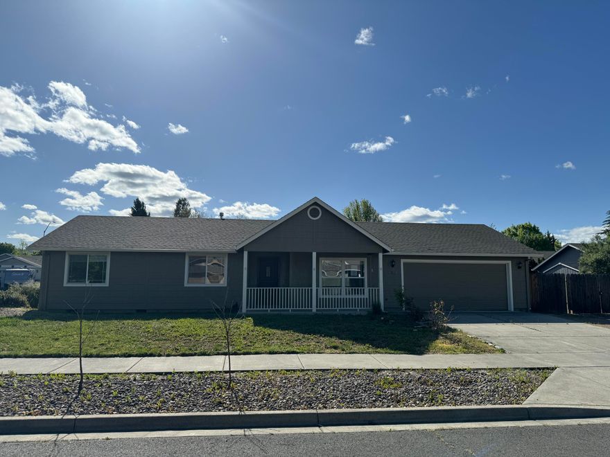 This 3/2 beauty in SW Medford is ready to go!!  Laminate flooring, vaulted ceilings, large corner lot and plenty of RV parking in a quiet part of town. Fenced and flat backyard offers a safe haven for pets and space for outdoor gatherings. With ample room for everyone to spread out, this home is a perfect blend of relaxation and entertainment. Don't miss this opportunity!