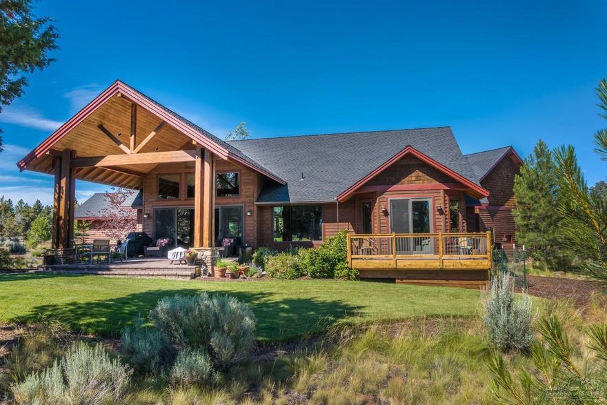 This custom-designed, quality-built home on the golf course at Aspen Lakes has it all! High ceilings and large windows let in natural light, two master suites on the main level, a true cook's kitchen with high-end commercial grade appliances. Hickory wood floors, 4 bdrms. and 3.5 baths, beautiful landscaping, mountain views, and a 5 car garage! Two years free Aspen Lakes golf for two players with purchase!