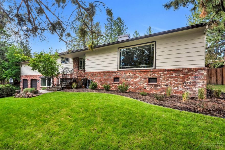 This Classic Midcentury Ranch located in the ever popular West Hills neighborhood offers 4/beds & 4/bath, office, vaulted beamed ceilings, huge gourmet kitchen with Wolf range, massive island with honed slate counters perfect for entertaining, living room has wood burning fireplace & oversized windows overlooking 40 acre Hillside Park, sun drenched, flat grassed back yard with standalone custom studio/shed, firepit, huge garage, tons of storage, massive rec room and one's own Pub.