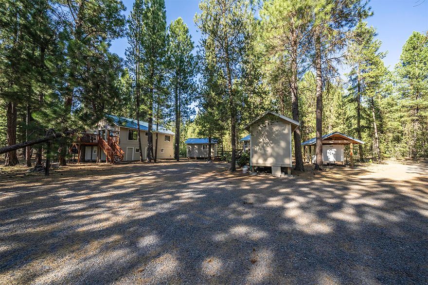 Don't miss this private retreat along the magnificent Sprague River! This gorgeous custom built 3 bed, 2 bath home includes a 1 bed, 1 bath guest bungalow, set amidst beautifully treed grounds and stunning waterfront views. The property includes a shop with built-in storage and ATV ramp, finished equipment and well building, carport for RV parking, direct waterfront access, and a private dock just steps from your front door. The main home features a light and bright kitchen open to the eating area and family room, a designated laundry room, beautiful vaulted wood ceilings and a wall of windows that opens to the oversized front deck. 2 legal parcels, the 2nd of which can be built on, makes a perfect 2+ family set up. Just a short drive to Hwy 97, hunting, skiing, fly fishing on the Williamson River, and Crater Lake National Park. 90 minutes to Medford, 30 minutes to Klamath Falls. This tranquil setting is a home for all seasons!