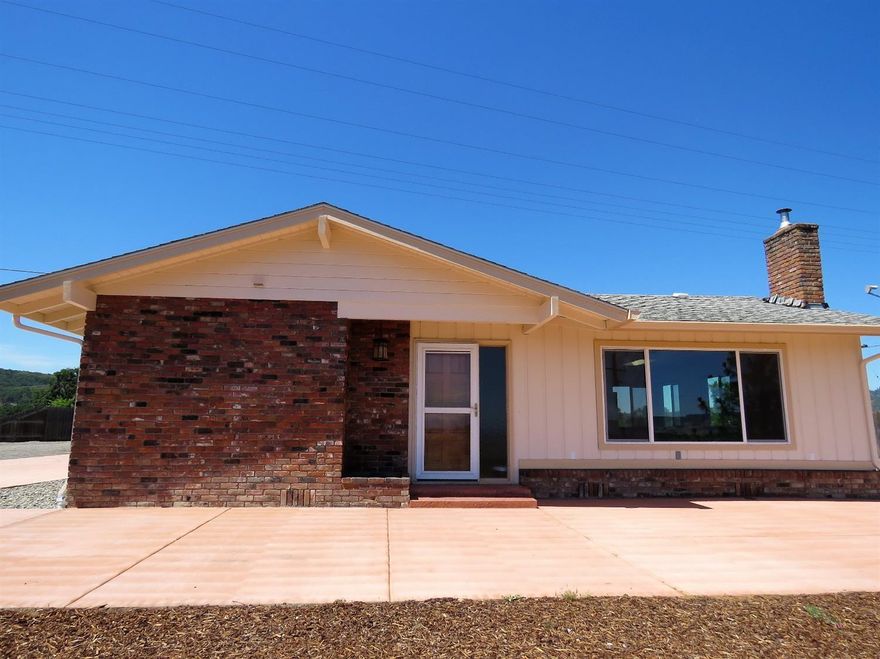 Looking for almost an acre close to town with PLENTY of parking for larger work trucks and/or recreational vehicles? This is it! Newly remodeled and freshly painted inside and out, this open concept floor plan home features all new stainless kitchen appliances, new counter tops,windows, water heater, sinks, toilets, bath tubs, light fixtures, ceiling fans and more along with easy care high quality laminate flooring throughout. And wonderful views of the surrounding valley and Table Rocks. The spacious 2 + car garage has extra tall 8.5 ft high and 12 ft wide doors and is large enough for an indoor work shop. The pole barn is perfect for storing a good supply of wood for a cozy winter fire and /or shelter for your animals. And along with a good producing well . You've got the complete package~ call for your personal tour today!