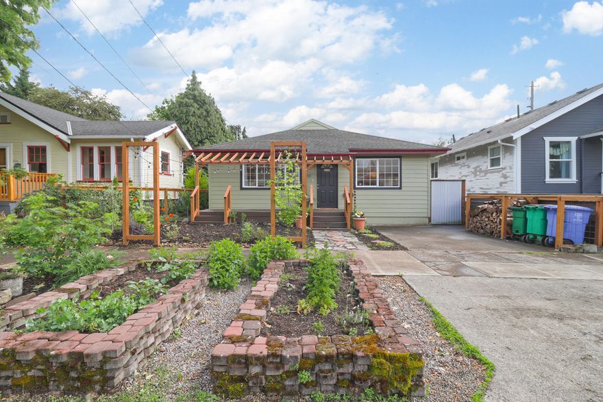 Stunning Roseway Remodel. Master Suite on Main. Beautiful hardwoods in living and dining rooms, all three bedrooms. Updated porch. Updated windows. Remodeled modern kitchen with granite tops. Remodeled bathrooms. Lush garden in front yard. Easy maintenance covered patio in back with studio workspace. Central air. Parking for two or more. Move in Ready! Click Vtour for 3D walk through. Home Energy SCore: 4 <br>