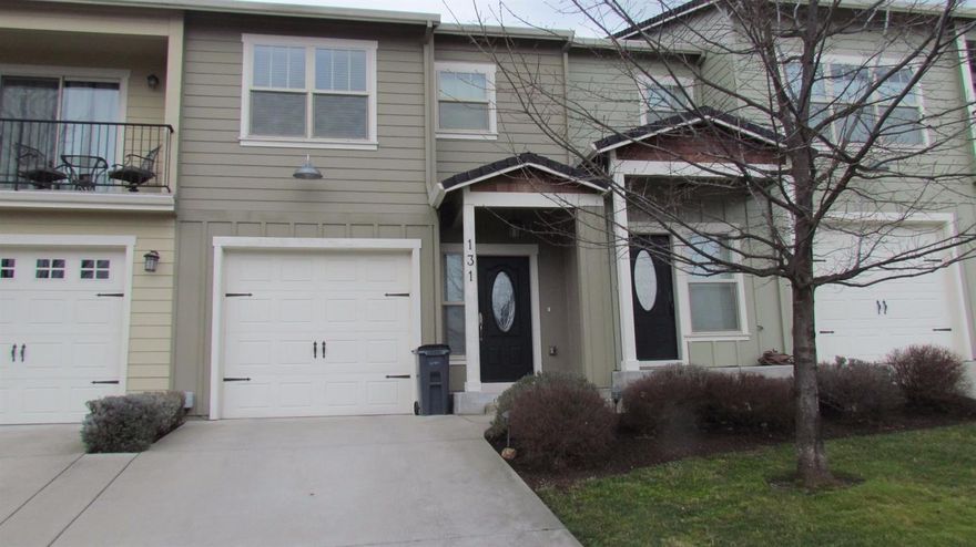 Beautiful town home in the east hills! Easy drive to shopping and services! Home features gorgeous wood floors throughout! Two nice sized bedrooms upstairs with 2 bathrooms. Balcony off the master, granite counters in the kitchen and baths, stainless appliances (including refrigerator), laundry is upstairs between bedrooms, easy to show!