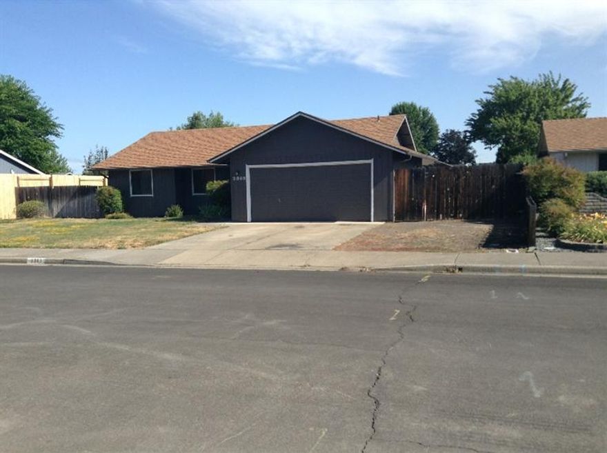 Big lot with a large fenced back yard in a very nice,established eastside subdivision. Carpet, vinyl, and both interior and exterior paint are all only a year old. This three bedroom, 2 bathroom house also features an energy efficient heat pump for both central heating and cooling, woodstove and a two-car garage with opener.