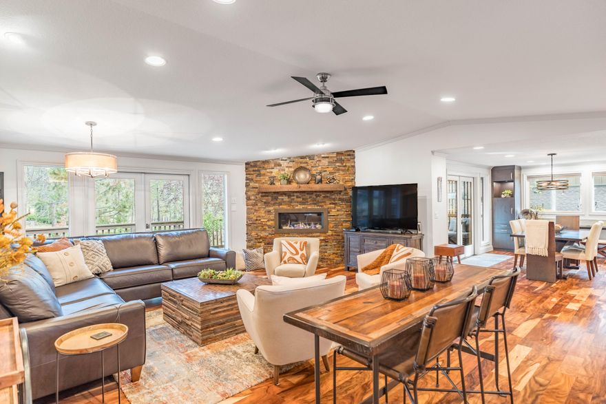 Experience modern luxury in this stunning 4 bedroom, 3.5 baths Sunriver home! High-end renovation from top to bottom, nestled in a peaceful cul-de-sac with a serene common area behind. Relax and unwind on the expanded back deck, embraced by privacy & accessed through one of the 3 French doors bringing the outside in. Indoors, a gas corner fireplace invites warmth, while the gourmet kitchen beckons with granite counters, stainless-steel appliances, and an inviting eating bar. Entertain in the chic bar room with granite surrounds, wine refrigerator, and floating shelves. The main-level Primary Suite exudes luxury, boasting a tiled shower and a soothing rain shower head. Upstairs, two guest bedrooms share a full bath, while downstairs, a 4th bedroom suite offers its own bath & can be used as a flex space if you prefer. Acacia floors, HVAC, and new windows exemplify the thoughtful upgrades. It's all new, it's all here - don't miss your chance to call this home!