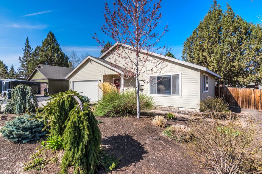 Pride of ownership in this cute single level 3 bedroom, 2 bath home.  A trendy shiplap wall, a wood mantel, and horizontal modernized electric fireplace that greets you as you enter the home.  Vaulted ceilings, upgraded tile countertops and flooring in the kitchen. Sliding glass door from the dining area leads you to a big deck for backyard barbecues.  Mitsubishi mini-split ductless system for efficient heat/cool.   A generous master suite with double closets.  Beautiful xeriscape front yard for ease of caring and a fully fenced, landscaped backyard.  A large 2 car garage and a gated side yard allows for plenty of space for a boat or RV with electrical plug. Desirable NE location near Mt View park, medical facilities, shopping & schools. This home has been nicely maintained and move in ready!