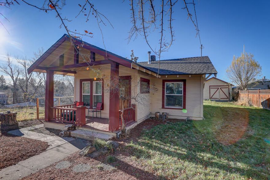 Fantastic NW Bend Location Near Mirror Pond & River! Come fall in love with this wonderful 1920's classic NW Bend cottage featuring a large 0.11 RM Zoned fully fenced lot, original 1920's HW flooring, wood stove w/brick hearth, vinyl thermal window upgrade, classic covered front porch, Gas furnace, detached garage in back with possibilities for additional living space and a brand-new roof in 2021!