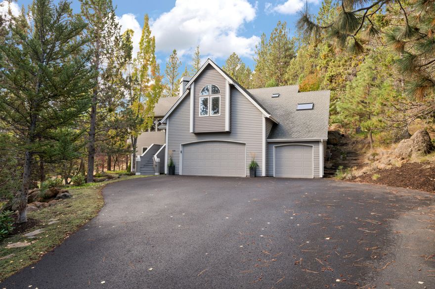 Privacy, space and tranquility in the HEART of Bend's Westside! Located in the sought-after City View neighborhood, and sited on a rare ONE ACRE property, this idyllic setting is surrounded by Ponderosa Pines and natural high desert landscape for year-round enjoyment. Spacious Great Room features light-filled windows overlooking the tree-tops, vaulted ceilings and elegant fireplace. Cook's kitchen w/expansive working island, Thermador appliances and ample cabinetry, opens to Dining area w/direct access to the charming & completely private back deck, flagstone walkways, patio & fire pit. Generously-sized Primary Suite offers a spa-like bath w/dual vanities, tiled shower and luxurious Jacuzzi tub. 3 additional Bedrooms, full Bath and Laundry Room on main level. Daylight basement features a fabulous Bonus Room with outdoor access, 5th BR/3rd full BA and additional storage. Oversized 3 car garage for all your Bend gear. Excellent proximity to Westside schools, amenities and Downtown Bend.