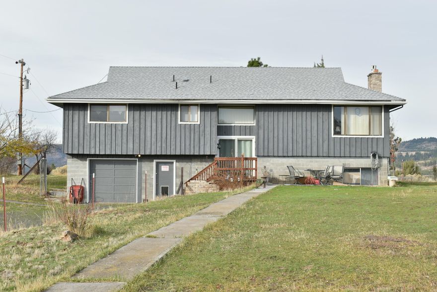 Amazing hilltop views from this 2784 sqft 4 bedroom 2 bathroom home! A finished basement adds a ton of storage with the option for more bedrooms, and has an attached single car garage! The home has been freshly painted on the outside, has new carpet, kitchen sink and counters with backsplash, propane heating stove, new flooring in the basement and some new roofing! A new septic tank just installed! There is also a walk in cooler and a dual fuel forced air heater, wood or electric! Outside there is a large shop and a large machine shed all on 18.42 acres. Enjoy fruit from your 2 apple trees, 2 pear trees, and a plum tree! Call today to see this amazing property.