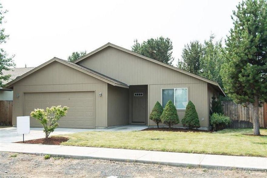 Huntington Meadows is a newer (2004) residential development in La Pine by Reinhardt Construction - with city water & sewer. The Crescent floor plan features vaulted ceiling in the great room, custom cabinets, upgraded carpet & vinyl, landscaped & irrigated yard. The back yard has a wonderful wood deck that includes a barbeque area and a canopy cover. There are plenty of trees for privacy too. The garage comes with a complete wall of beautiful cabinets and a work bench.