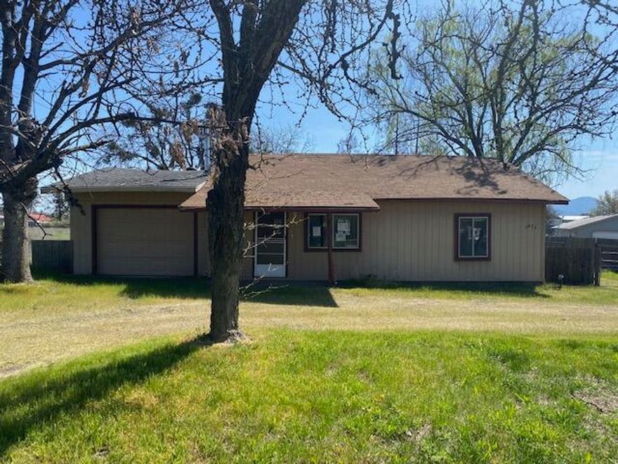 Lots of potential with this close in rural property.  Offers a large lot with a gated entry to back section and pull through driveway.  This 2 bedroom 1 bathroom home offers a large living room and kitchen.  There is a 1 car attached garage and a  lot of room.