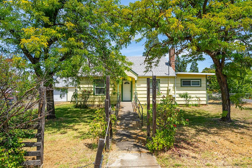 Location, location, location! Right across from Phoenix High School, this charming property features 3 bedrooms (plus an office that can be used as an additional bedroom), 1 bathroom, 1560 sq ft, spacious 0.42 acre lot (lot can possibly be split and sold off separately), updated kitchen w/ large island, granite countertops, and ample cabinetry, detached single car garage, newer interior paint (except the bathroom), shower/tub combo in bathroom, refinished hardwood flooring, woodburning fireplace, & much more! Perfect opportunity for an investor looking to live on the property while splitting the lot and building their dream home or for anyone looking to be close to everything Phoenix has to offer! Buyer to perform their own due diligence regarding possible lot split and development potential. This one won't last long on the market so contact your agent today for a personal tour, before it's too late!