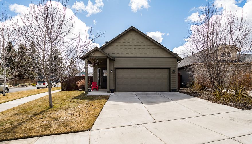 Outstanding value on this SE Bend single level home in Gleneden neighborhood. Carefully constructed by Hayden Homes, this 3 bedroom, 2 bath, 1201 sqft is sure to please. Open and inviting great room floor plan with ceiling fan and designated dining space. Spacious kitchen with tiled counters and backsplash, gas range with built in microwave, plus much more. Private master suite with backyard access complete with large master bath with walk in closet and double vanity. Great separation from secondary bedrooms.  Amazing outdoor living space with fenced back yard and two separate patios is perfect for entertaining. Located on a corner lot and close to schools, shopping, and everything Bend has to offer. Don't forget the 2 car attached garage. Call your broker for a private tour today.