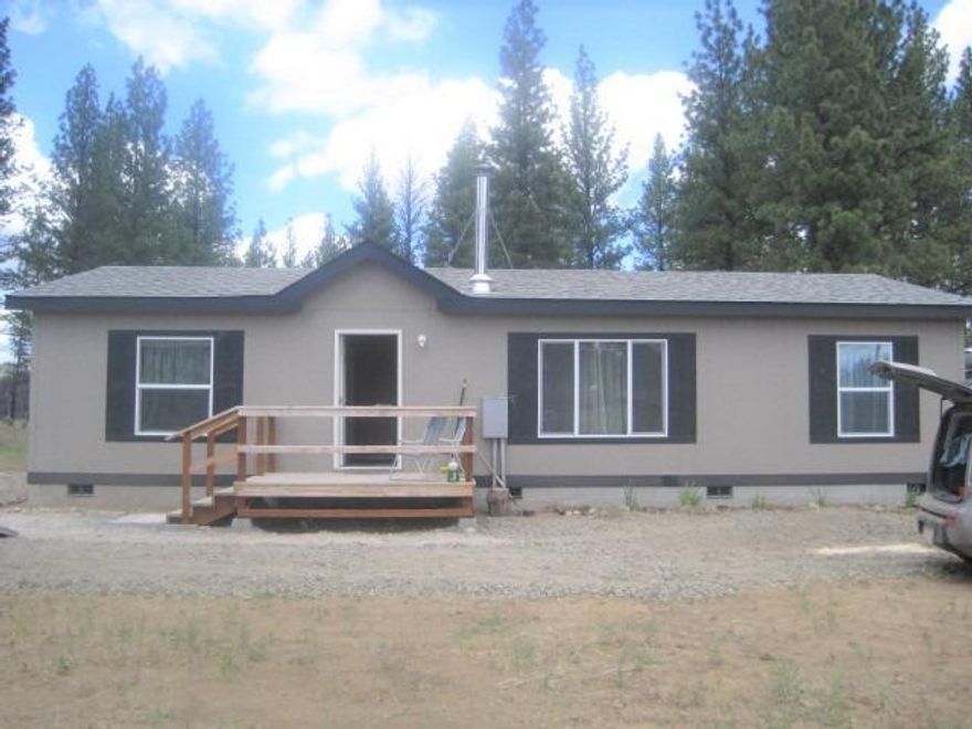 New Never Lived in Fleetwood Manufactured Home on a full Foundation.All Appliances are included in the sale including Washer and Dryer, 2 Skylights,Jetted Tub in Master Bath,Wood look Vinyl Flooring thru-out, Front Deck and Back Decks,4.65 Acres with Trees,2.5 Acres fully fenced,Insulated Pump House with Electric and Shelving, New Septic and New Well,Everything is New and ready for you to move in. Heat Pump under the Home.Heat Pump also provides Air Conditioning. Certified Wood Stove. Home is certified Energy Star. House has extra Insulation and 2x6 Construction.This home will make someone a Beautiful Country Home