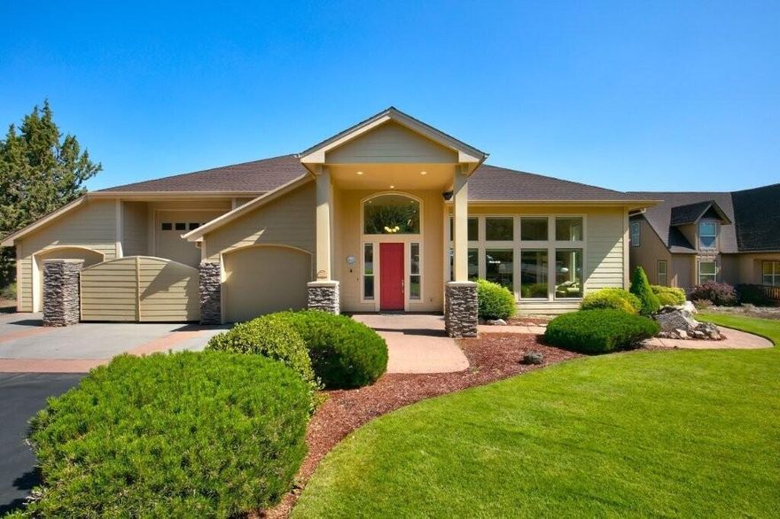 Setting itself apart as one of the few properties in Eagle Crest with an RV bay, this well-maintained custom-built Sunterra home has had one owner. Enjoy the great room with its 12 ft ceilings, abundance of windows, surround sound & wet bar. The open kitchen features a breakfast bar, two pantries, a warming drawer & plenty of counter space & storage. A large primary bedroom has a walk-in closet, double sinks & an oversized walk-in tile shower. Secondary bedrooms share a jack & jill bathroom and all bedrooms have their own outside door & patio. Some of the features of this energy efficient home are radiant floor heat, an air filtration system & recirculating hot water. The garage is a dream at 1317 sq.ft. with three doors/bays, one that is a 41 ft deep RV bay with a 15 ft ceiling, 30 amp hookup & water plus a utility sink, two man doors to the outside and a finished heated storage area above with a pull down ladder and a big side door. Common area & walking trails out your back door!