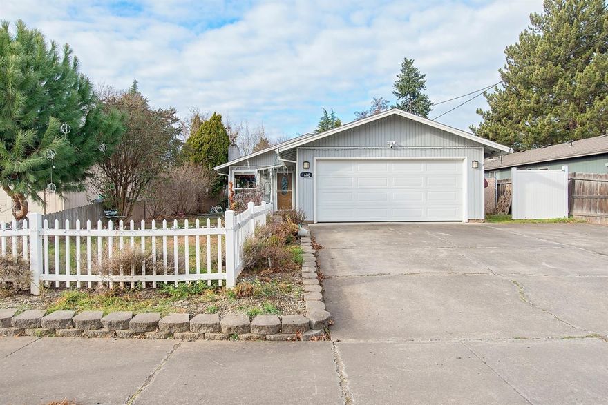 This home features 1248 sq. ft with a two car attached garage and RV parking. Boasting 3 bedrooms and 2 full bathrooms you also have central heat and air. There is a nice living room with a pellet stove and dining room off of the kitchen. The kitchen has plenty of counter space and cabinets. There are also two pantries. Three good size bedrooms, tub in guest bath. Outside you will find a covered patio and good size grass backyard. Wonderful area to entertain friends and family. There is RV parking on the side of the home.