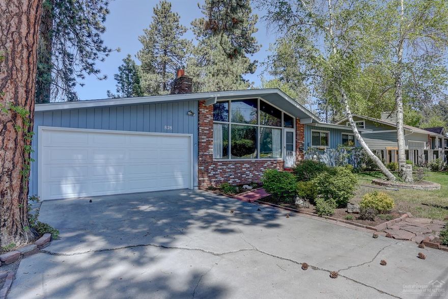 Desirable Midtown location! Single level home on almost a quarter of an acre in the middle of Bend. 1206 sq ft plus 264 sq ft sunroom! Close to downtown, hospital, grocery stores, parkway access and shopping. Goodrich Park and paved street slated to begin Spring of 2020. Short term rental permit opportunity and room for possible ADU. You don't want to miss this!