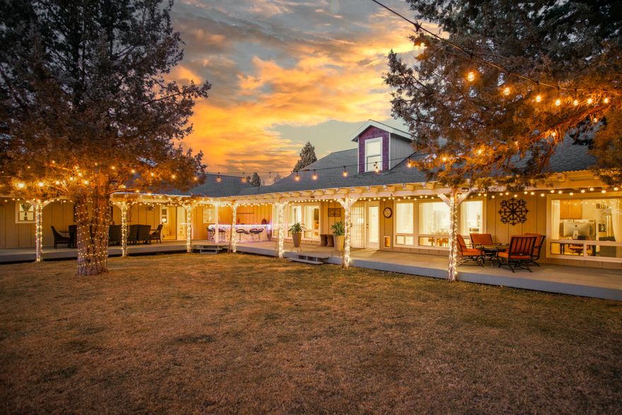 This extraordinary rural retreat, located just minutes East of Bend, is now being offered for sale! The 9.9 acre property provides a peaceful oasis to its owners and guests. Equipped with a spacious backyard, an outdoor bar, and an expansive wood deck: this property is an entertainers dream! Outside, the home is surrounded by gorgeous juniper trees that light up at night with an extensive light feature. This listing offers a beautifully sunlit living space with 3 skylights and an open floor plan of 4,266 sq ft. The home provides 2 primary suites on the main level, each offering outdoor and patio access. The
beautifully remodeled kitchen is located centrally between the two primary bedrooms. Walking upstairs, you will find 2 additional bedrooms, a full bath, and a window nook for reading or office needs. The property features a 400 sq ft guest cottage, a custom-built chicken coop, concrete dance floor, gazebo, water feature, and 3 storage sheds. Come experience the serenity of East Bend