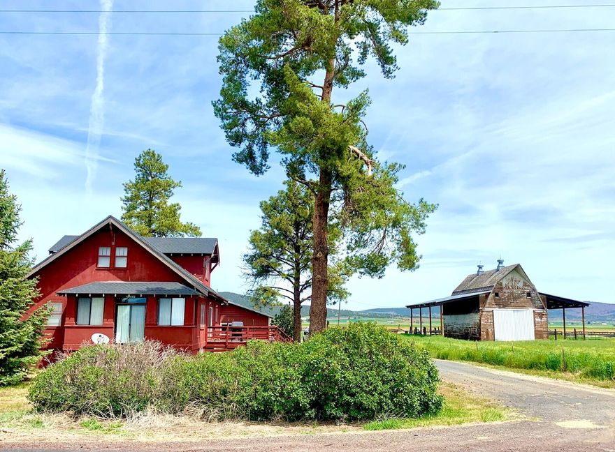 This 1930's farmstead sits on 78+ acres, and has loads of character and functionality. In addition to the charming 2,188 sqft farmhouse, there is a detached garage, shop building, a large ''chicken house'', grain silo, hay barn and of course the original gambrel roof barn. The home is spacious - with an open living and dining area, 5 bedrooms, 2 bathrooms, a large basement, and even a  walk in refrigerator/cooler! The property has KID A water rights and has some older corrals that could be fixed up for livestock. Make your appointment to view this great listing located between the small communities of Merrill and Malin, about 20 miles southeast of Klamath Falls.