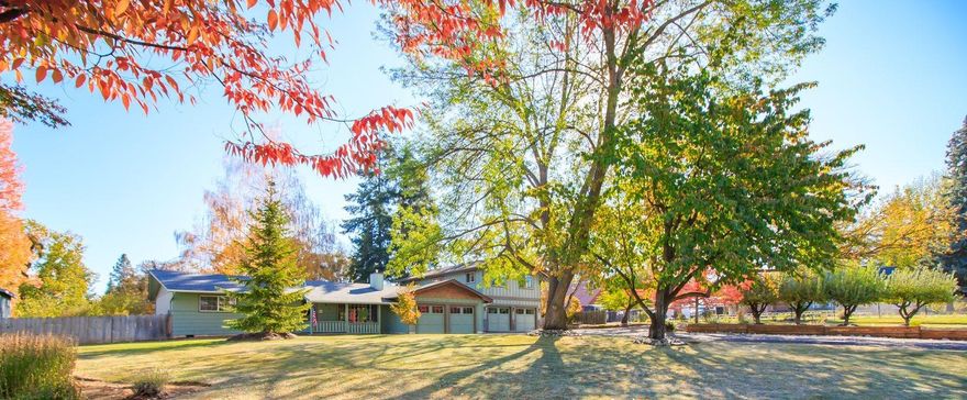 Beautiful rural setting between Medford & Phoenix, convenient to everything. Magnificent mountain views. Landscaped oversized lot w/garden, fruit trees and room for a pool. Home updated w/beautiful custom features. Kitchen has cherrywood shaker cabinets, granite counters, farmhouse sink, double convection oven, breakfast bar. Peaceful living room w/gas fireplace, cherrywood mantel, pebblestone, tile hearth.  3 bedrooms on main level, one w/ensuite bath has tiled shower, vanity, heated floor w/pebblestone accents. The hall bath also has heated floors, soaking tub. One bedroom/office/workout room is on opposite side of home. Upstairs is an amazing huge primary bedroom suite w/stunning mountain views from every window, library, walk-in closet w/built-in cherrywood drawers, bath w/dual sinks, soaking tub, heated floors, dual heads in shower. Tiled, covered patio. 2 attached double garages. RV/boat parking. Room to work, learn and play from home.