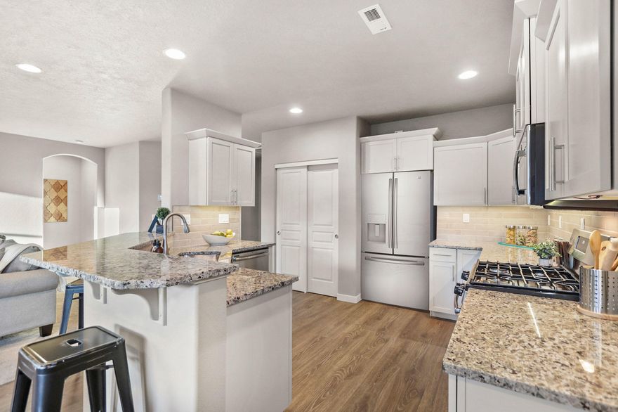 Maple Meadows offering the Hudson floor plan, which is an efficiently-designed, mid-sized single level home offering both space and comfort. The beautiful open kitchen is a chef's dream, with quartz counter top, pantry space for extra storage, stainless steel appliances with a gas range, plenty of cupboard storage including soft-close cabinet drawers and a breakfast bar. The expansive living room and adjoining dining area complete this eating and entertainment space with a gas fireplace included with tiled surround. The spacious and private master suite boasts a dual vanity bathroom, walk-in shower and an enormous closet. The other two sizable bedrooms share the second bathroom and round out this well-planned home.  This large homesite boasts an outdoor living space is just as impressive as the interior, with a fully fenced yard and covered patio with outdoor lighting.  Estimated completion November/December 2020!