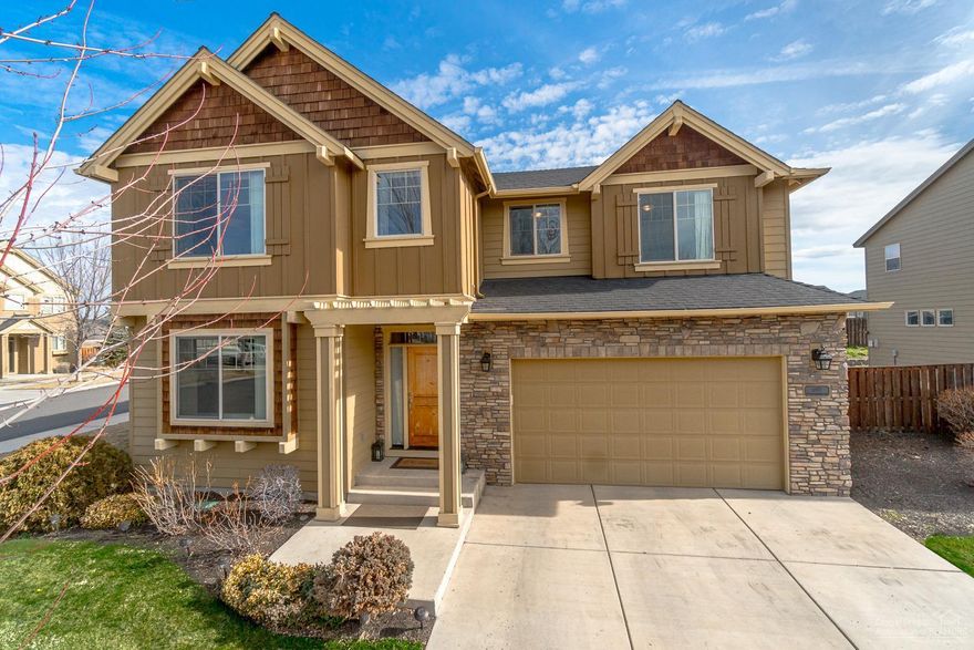 Priced to sell quick! Well cared for home in NW Redmond's Pahlisch community w/seasonal pool, clubhouse & amenities. Recently updated, this home offers affordable luxury w/Hickory hardwood floors, Quartz slab counters, farm house sink, full height tile backs plashes & a 2 story Great Room w/open staircase. Arched entries, art niches & specialty lighting offer charm & character. Kitchen is just 2 years old w/SS appliances, tons of cabinetry & prep space + a breakfast bar. Living area is bright & inviting w/a corner gas burning fireplace w/stone accents. One lg bedroom & full bath downstairs that dbls as an office space or 4th/5th bedroom. Upstairs there is a HUGE bonus room w/closet, 2 guest rooms laundry & a spacious Master Ste. Coved ceiling accents, over sized bath suite w/shower & soaking tub, dbl sinks. Laundry is conveniently located on the 2nd floor. Triple car garage w/shop area, low maintenance back yard & HOA maintained front yard - no lawn mower necessary!