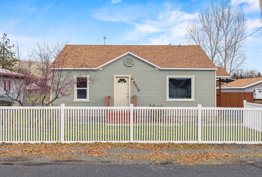 Completely renovated and move-in ready! This charming home has been updated from top to bottom with too many improvements to list them all. Enjoy fresh interior and exterior paint, brand-new laminate wood flooring throughout, a new composition roof, and updated bathroom. The kitchen shines with all new appliances (all included in sale), and the home is powered by a new breaker panel for peace of mind.
Outside, the property offers a fully fenced quarter acre lot with plenty of room for toys, gardening, or RV parking. Relax or entertain year-round on the private covered back patio or the covered side porch. The oversized, detached two-car garage is a rare find—featuring two separate office spaces, plus plenty of room to park cars, is wood stove ready, and has a dog run with a doggie door leading directly inside. An in-ground sprinkler system keeps the yard looking great with minimal effort. This beautifully refreshed home is a gem.