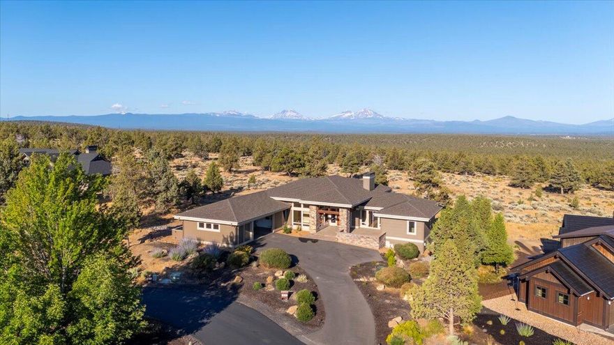 Luxury Living in Eagle Crest Resort! One of Central Oregon's premier resort communities.  Nestled in an exclusive gated enclave of Eagle Crest, Scenic Ridge. This crafted home built by the renowned custom home builder Sage Builders, offers unobstructive panoramic Cascade Mountain views and refined resorts living at its finest. Thoughtfully designed with soaring ceilings, Kalispell Brushed Hickory floors, Persian Caramel Granite countertops, radiant flooring in both bathrooms, floor to ceiling Manzanita Cliffstone fireplace and walls of windows that frame the breathtaking scenery that brings the outdoors in, within every room. Perfectly suited for the art enthusiast, the home features custom lighting throughout, thoughtfully placed to showcase artwork and create a gallery-like ambiance in every space. Front courtyard and back deck to enjoy all the views from every angle. Even with all of this there is still room to build an already approved Casita on this 1.29 acres.