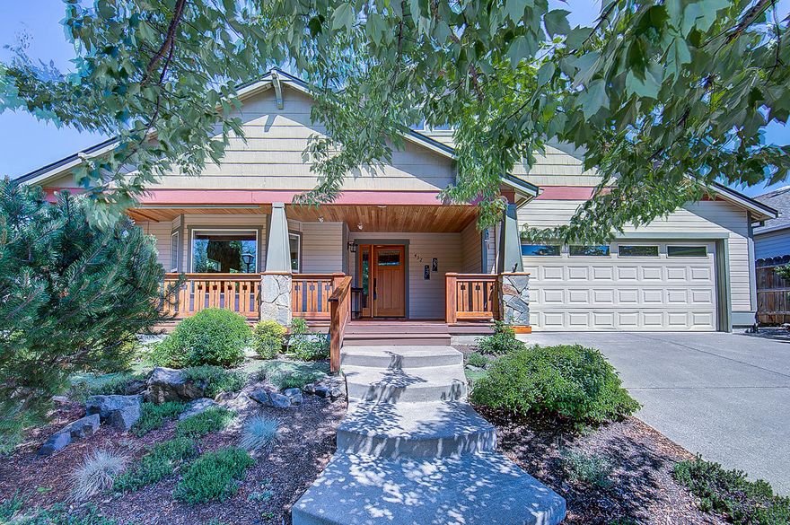 Wonderful Craftsman style home on a quiet street. Large living room filled with natural light, which is perfect for displaying artwork, soaring ceiling and an open floor plan. Gas fireplace surrounded by custom bookshelves and overhead windows. Main level master suite bathroom has marble, walk-in shower and free standing tub. On the main level you have a 2nd & 3rd bedroom. The 2nd bedroom has  glass doors leading to the outside. Lovely cherry wood floors thru most of the home. Gourmet kitchen with great working area and views. Many of the kitchen cabinets have pull out or rotating shelves. Upstairs there is a large bonus room which could be a 4th bedroom. There is a 1/2 bath and closets, large area which could be further developed. Bonus room has a wall of windows and 2 skylights. Flag stone patio, large electric awning with a remote control, solar panels curtail the electrical costs. Garden is a Zen moment with a fountain, flowers blooming & walkways leading to extra private areas.