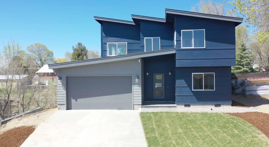 Come enjoy this brand new contemporary style new construction! This two-story home features 1899 sq ft.  Three bedroom 2 1/2 bath granite and vinyl flooring  throughout. Enjoy the main level entertaining company, and the privacy of upstairs with a master overlooking the city estimated completion date is February 2021.