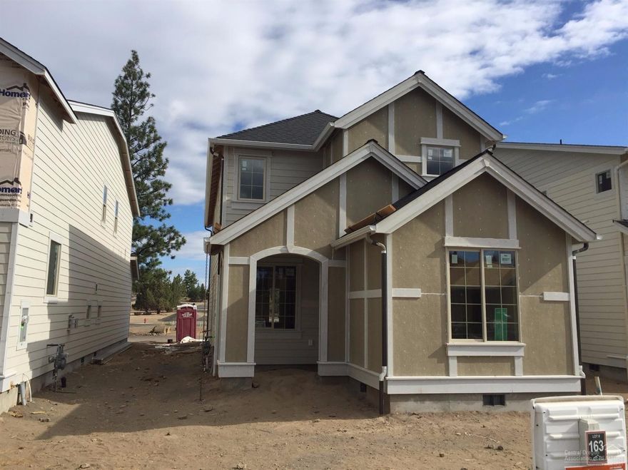 New Pahlisch Homes quality construction. Solid quartz countertops, Knotty Alder cabinetry, gas fireplace. 3 bed, 2.5 baths, den, upstairs loft area, located at The Bridges. Open floor plan with great room, dining and kitchen easily accessed for gathering. Master suite with walk-in closet, utility room on the second level. Superior community amenities just a short walk from your door: trails, pools/gym/clubhouse. Exceptional builder warranty. Photos of similar home, actual specs will vary. Colton-2-C-1638-