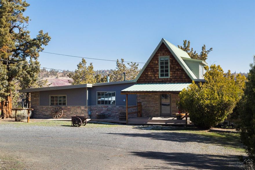 Nicely updated home with a rustic feel located in Whispering Pines on a large 1.03 acres lot. This 4 bedroom 2 bath home features master on main floor, upgraded master bathroom with tile shower. Large open and bright kitchen with wood floors. Over-sized back deck that overlooks property with Mountain Views. Fully fenced backyard with green house. Gravel round about driveway. Home has been recently painted. Minutes away from downtown Bend and minutes away from the Redmond airport.