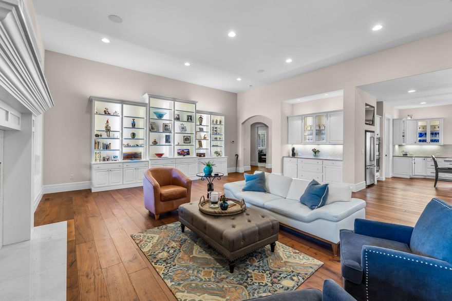 This EXQUISITE SINGLE LEVEL custom home in Awbrey Park is the perfect blend of casual elegance, architectural design & exceptional craftsmanship. A soothing water feature will greet you upon entering the courtyard & an open concept floorplan awaits you with beautiful hardwood floors, plantation shutters, built-ins, tall ceilings & large windows, making it exceptionally light & airy. The spacious gourmet kitchen is well appointed w/ gorgeous granite counters, large island, double ovens, Wolf cooktop, 2 dishwashers, butler's pantry w/ sink, shelving & lots of storage. Large primary suite w/ luxurious bath, walk in closet, nicely separated from the guest suites. An 1,100 sq ft private, pavered covered back deck is an entertainer's delight, ideal for large gatherings or that morning cup of coffee. Paver driveway & oversized 3 car garage complete w/ customized, vented rubber tile flooring. On a low maintenance ½ acre lot. Close to Sawyer Uplands Park & all that we love about Central Oregon!