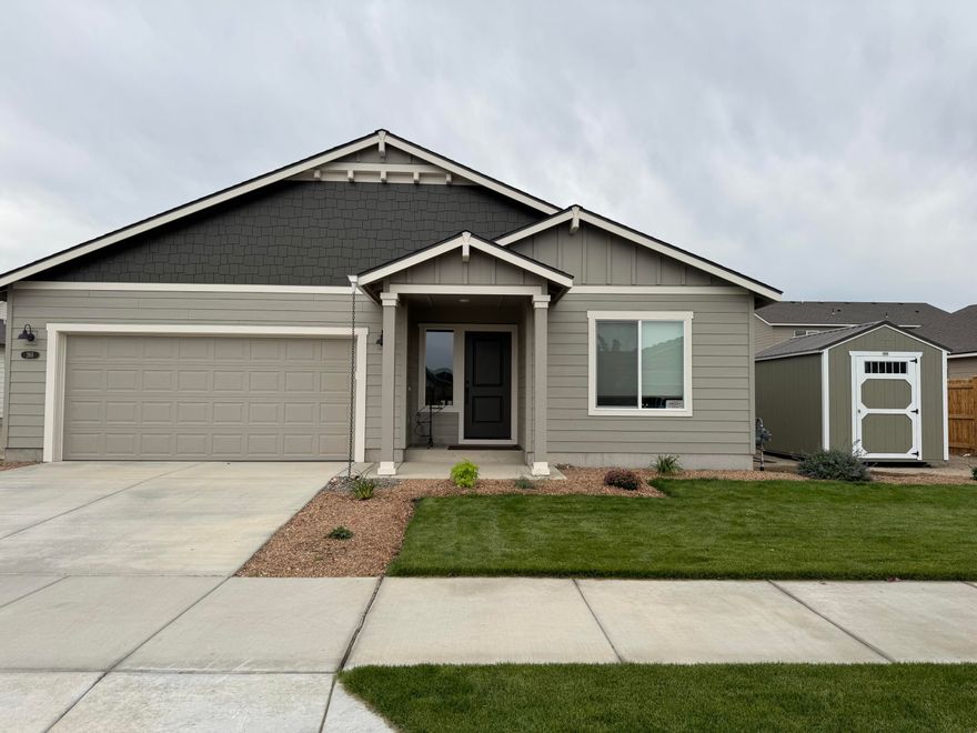 Motivated Seller's!! This beautiful 3 bedroom 2 bathroom 1,553 square foot home has only been lived in a few months!!! It has an open floor plan. Living room has a gas fireplace and vaulted ceilings, Kitchen and bathrooms have quartz countertops. All brand new appliances! Including: refrigerator, gas stove, dishwasher,  A/C, and microwave. Large master bathroom with two sinks, walk in shower,  large linen closet, and toilet room. Master bedroom is good size, has large walk in closet, and lots of light. Nice covered back porch. Front yard is in with sprinkler system. A nice size side and backyard you can make your own! A brand new storage shed as well!! Don't hesitate!! Call your favorite Realtor today!!