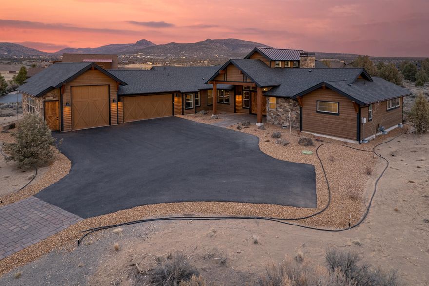 Enjoy living in beautiful Powell Butte, just a short drive from Bend, in the heart of Central Oregon. This custom home offers a grand covered entry opening to a Vaulted Great Room w/gas burning fireplace w/built in cabinetry.  Spacious entertaining area w/Gourmet kitchen & Dining space to accommodate your guests. Lg central working island, Gas cooktop, corner pantry & main sink has an incredible outside view. Owner Suite is Vaulted, bath ftrs dbl vanities, curbless tiled shower, walk in closet & a secret safe! Adjoining is a spacious office/den/workout studio. Each Guest Suite features a private Bath. Step outside & cozy up to the gas firepit or watch the snow fall while you bbq. Don't miss the bonus 32'deep garage bay w/12' RV door - perfect for your Adventure rig! As a Brasada home owner, you'll have access to the Athletic Center w/Pools, Water Slide & Lazy River, Equestrian Center, 18 Hole Golf Course, Spa, Restaurants, Hiking, Biking, Horseback Riding, Fishing & much more.