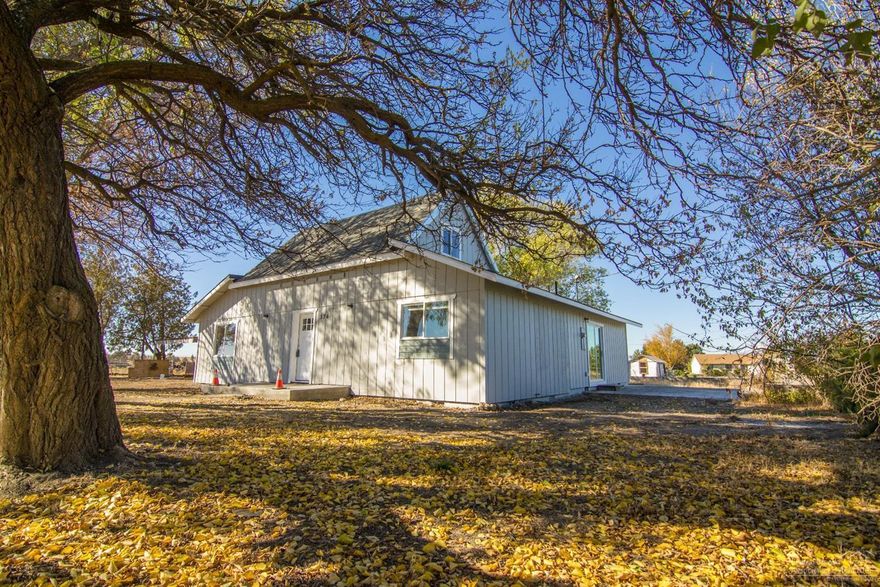 Beautiful old home that has been completely remodeled. Just about everything is new. 3 bedrooms, 2 bathrooms and a huge great room. Hickory cabinets with solid surface counters throughout. The kitchen has an island with bar seating. Lots of cabinets in kitchen for storage. Vaulted ceiling in great room with plenty of room for dining. Main level master suite has walk-in closet and the bathroom has double vanity sink. New vinyl windows throughout. One bedroom and a loft area on second floor. Laminate floors in great room, dining and kitchen area. Huge utility room which also houses the brand new electric furnace. The detached garage/shop area has plenty of room for extra storage. All on 1.28 acres, close to town and with great Cascade mountain views.