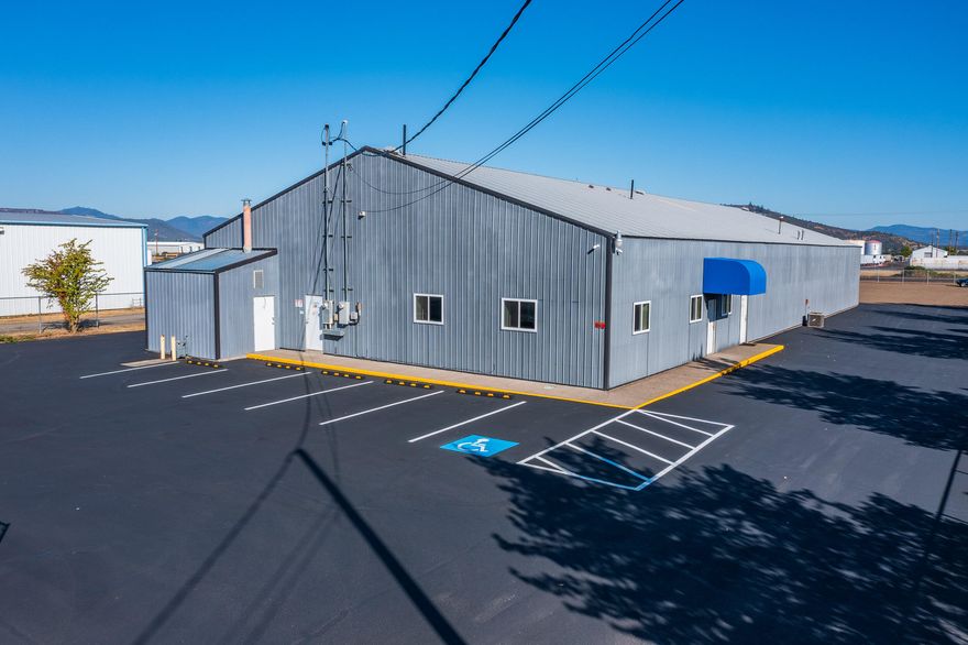 8,400 Sf. Industrial Building on 1.17 General Industrial zoned acres. The interior of the building has been newly insulated and windows have been added to the temperature controlled office space. One full bathroom connected to the office space. The property has two large access points off Industrial Circle and good access around the entire building with freshly sealed asphalt encompassing a large portion of the property. The property is secured with new fencing and gates on the perimeter of the property. The building is served by one 14 Ft. roll up door to the rear of the property. Possible Lease Opportunity.