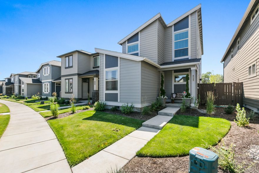 Nearly new home in Triple Ridge! Three bedrooms plus an office and two separate living rooms! Two car garage is attached and located through an alley entrance. Pool access and front landscaping are just a few of the amenities you'll enjoy. The master suite is gorgeous with vaulted ceilings, a private bathroom, and the BEST custom built closet and jewelry/accessory storage you've ever seen. Kitchen includes quartz counters and gas range! Upgrades of over $10,000 including custom California Closets, air conditioning, light fixtures, blinds, appliances and more! Interested in investing? Rents are estimated at $1850 per month and homes rent quickly in this neighborhood!